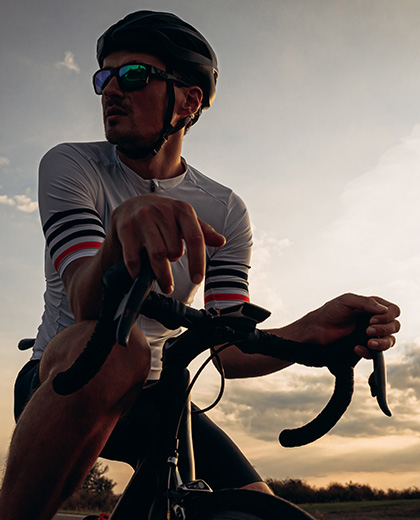 man-with-bicycle-resting-during-sunset-ride-2026-03-16-05-13-06-utc